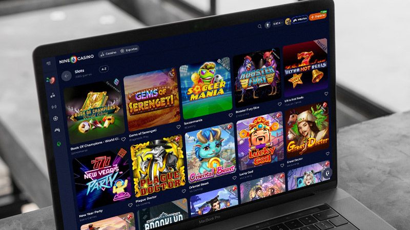 Página de Slots do casino Nine no laptop